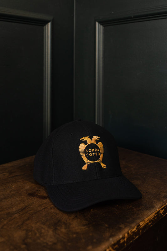 Black baseball hat with gold Sopra Sotto logo